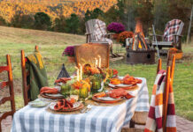 Stylish Fall Entertaining Essentials to Elevate Your Home Gatherings Fall tablescape with bonfire in the background