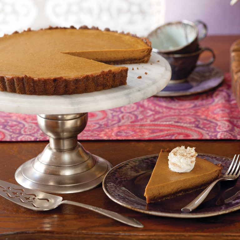 Pumpkin Caramel Tart on a cake stand