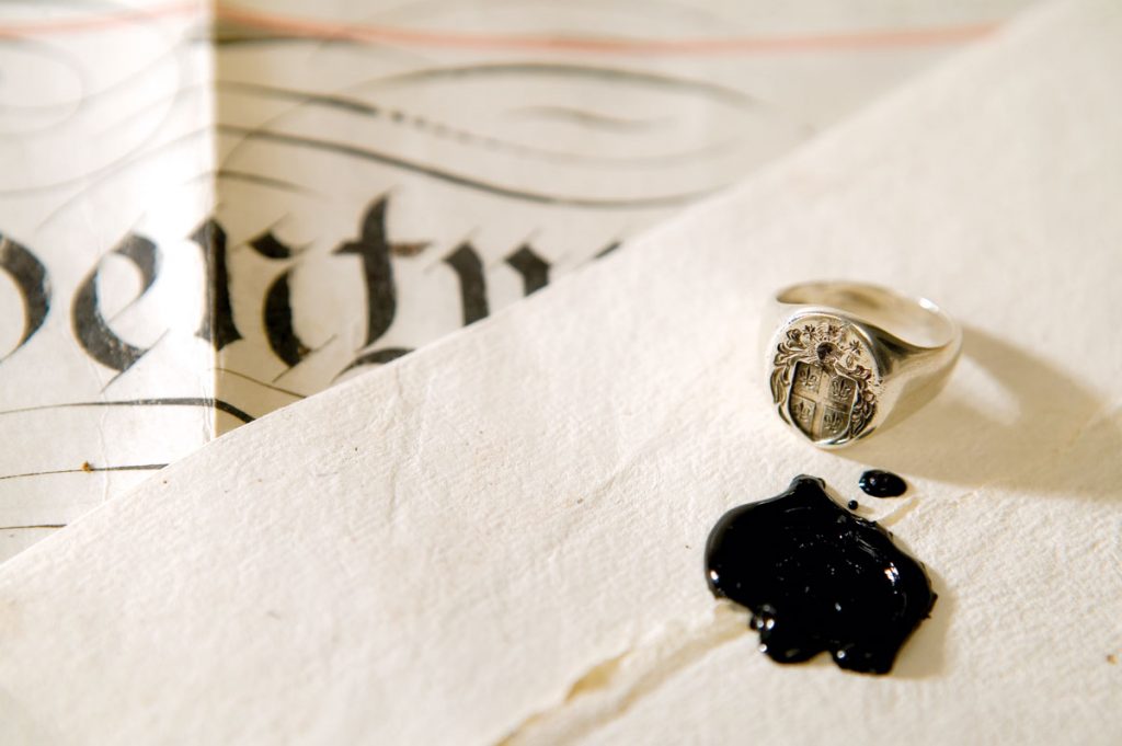 A picture of a letter and letter seals