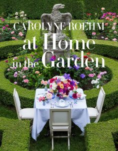 A picture of the cover of At Home in the Garden by Carolyne Roehm