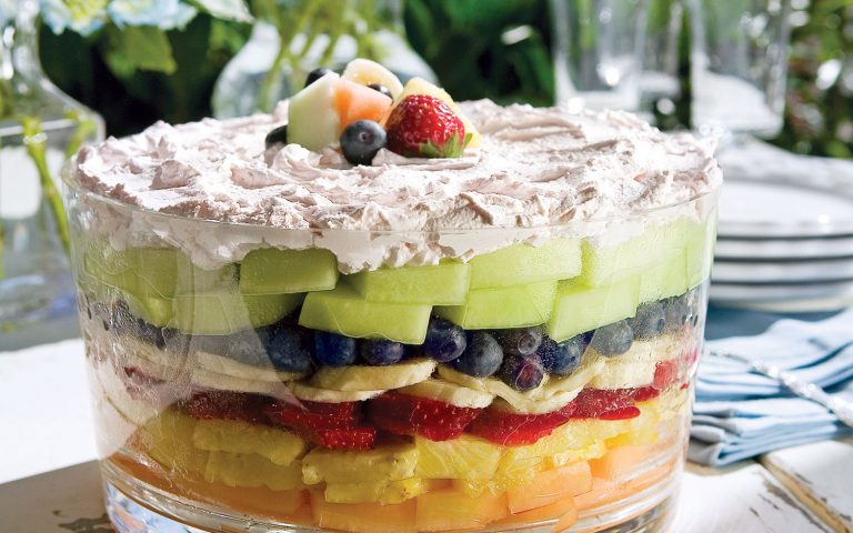 A horizontal picture of seven layer fruit salad