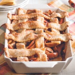 Apple-Cranberry Cobbler in a white fall baking dish