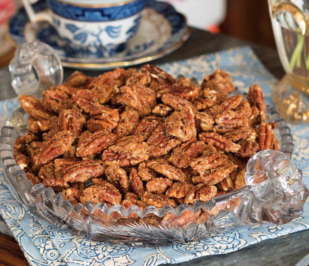 Autumn-Spiced Pecans in a glass dish