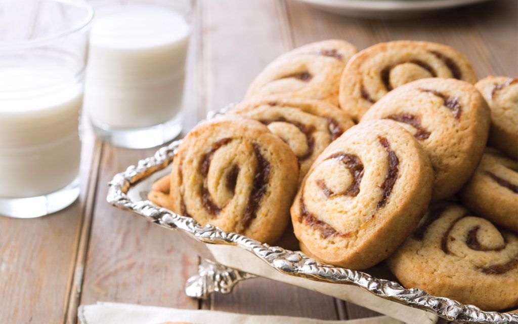 Orange-Date Pinwheels on a silver tray