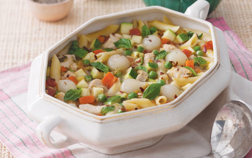 Chicken Primavera Soup in a white tureen