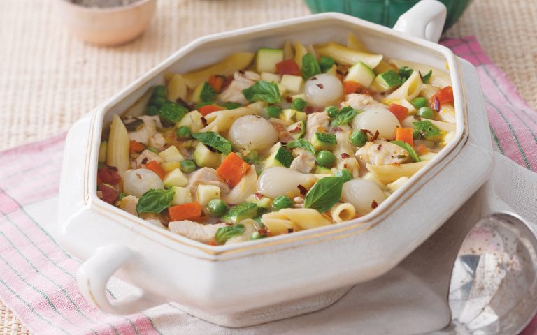 Chicken Primavera Soup in a white tureen