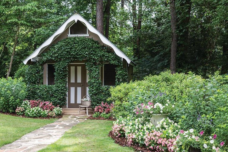 A garden surrounding a playhouse