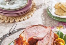 Cane Syrup-Glazed Ham Glazed whole ham served with charred lemon halves