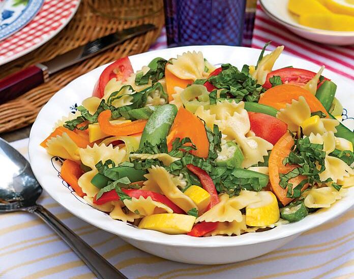 Summer Primavera Pasta in a white bowl