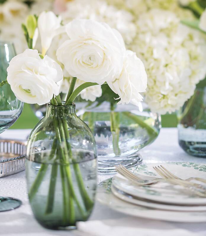 Small vase of white ranunculus 