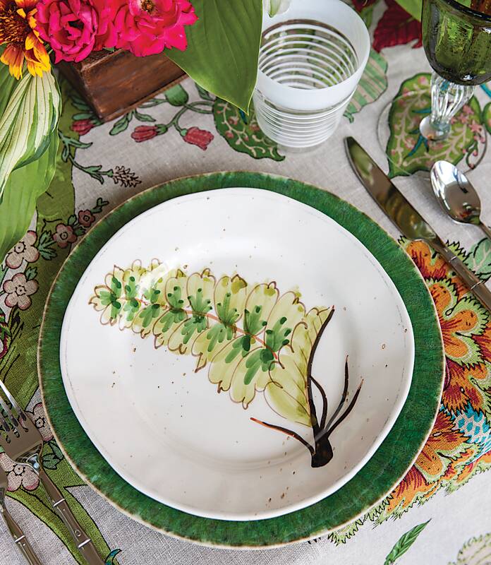 Place setting featuring a palm leaf plate