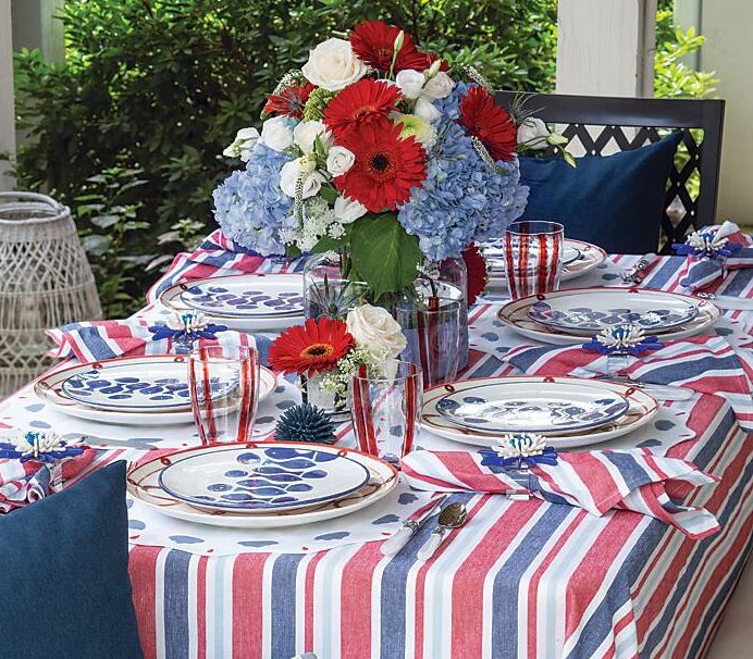 Tabletop decorated with red, white, and blue accents for Labor Day activities