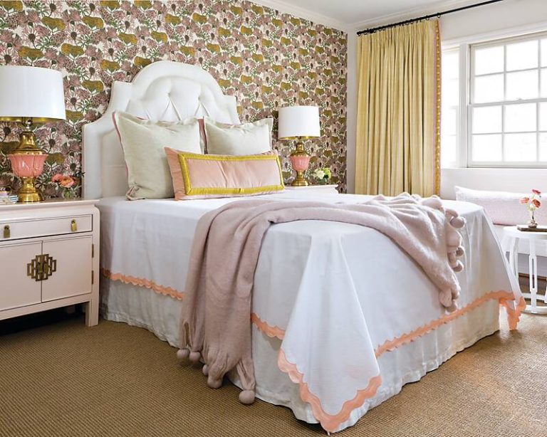 Wondrous Wallpapers: A bedroom featuring an accent wall of pink floral wallpaper