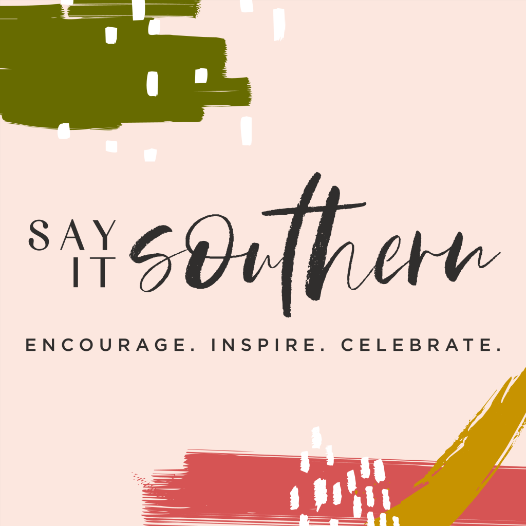 On a pale pink background, text reads "Say It Southern. Encourage. Inspire. Celebrate"