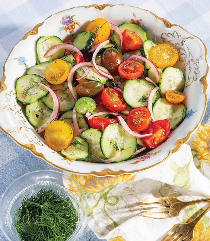 Cucumber, Tomato, and Onion Salad in a white floral china bowl