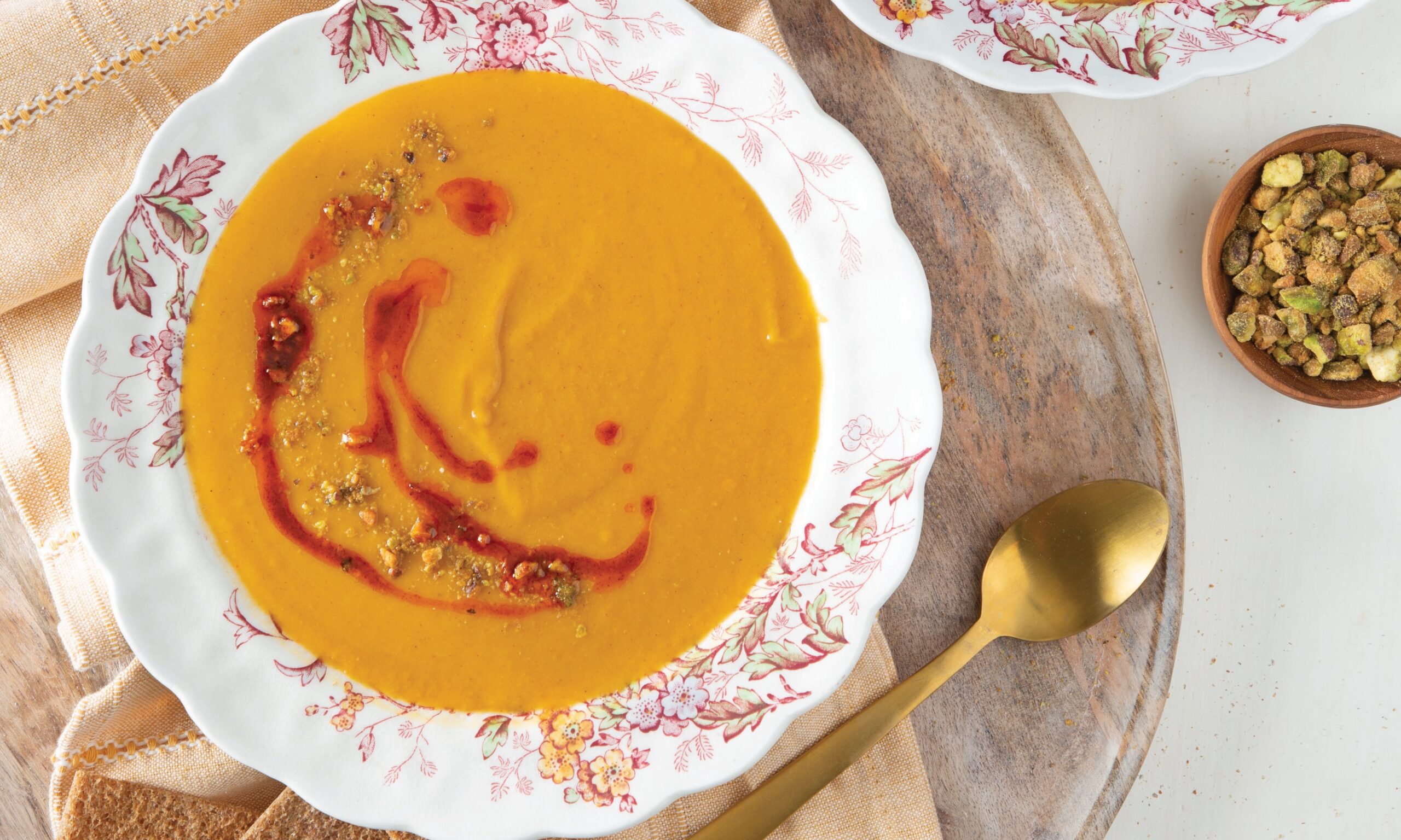 Curried Sweet Potato and Persimmon Soup in a bowl.