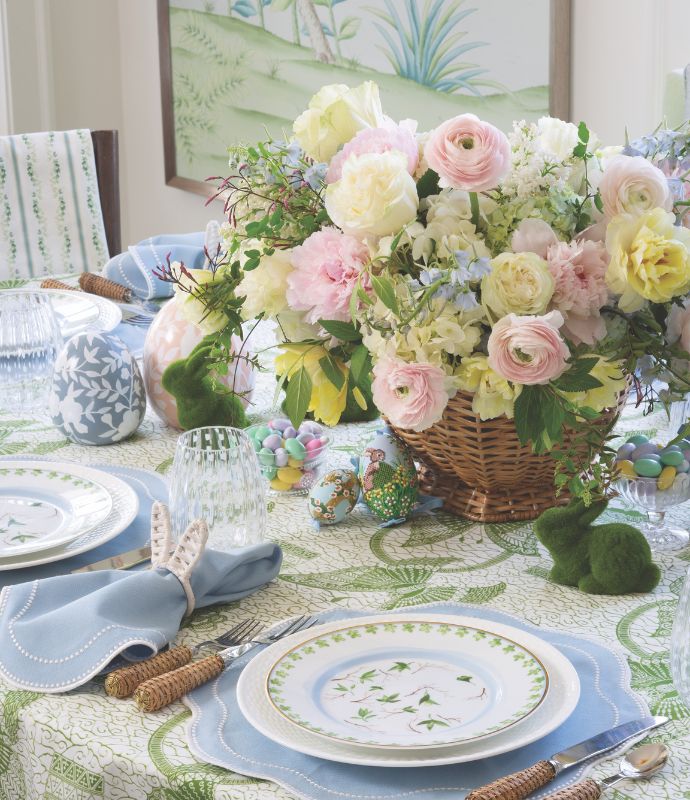 Easter tablescape with pastel flower arrangement in a basket