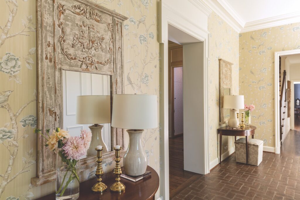 Entryway with floral wallpaper