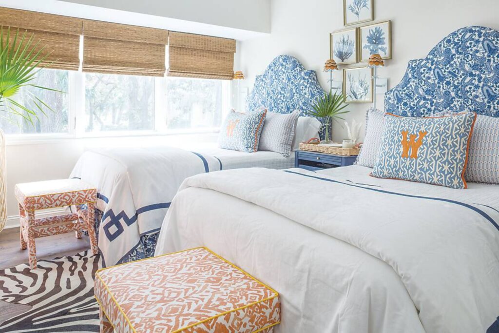 Coastal-inspired bedroom with 2 beds