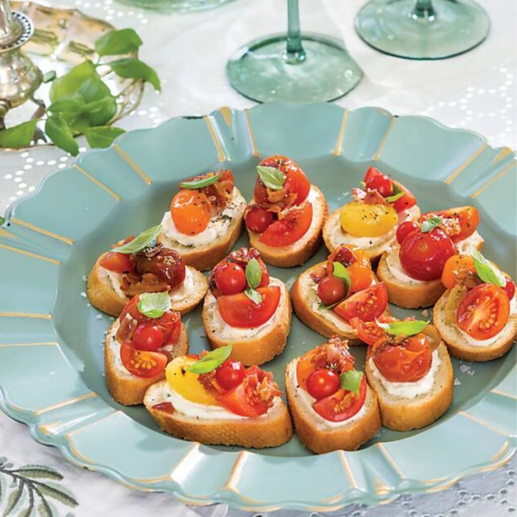 Mini tomato tartines on a blue plate
