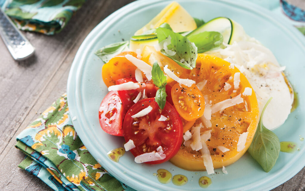 Summer Squash and Tomato Salad on a blue plate