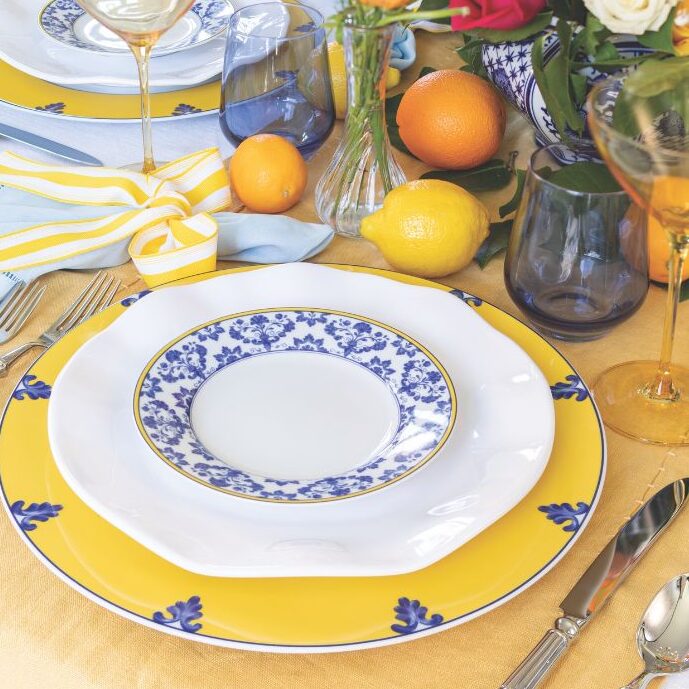 A yellow, blue, and white table setting