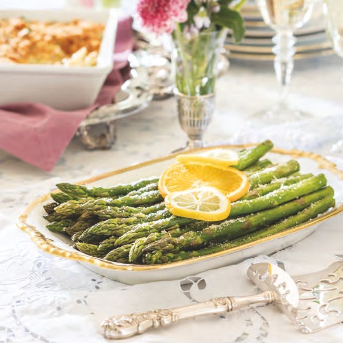 Roasted Asparagus with Citrus on a white serving dish