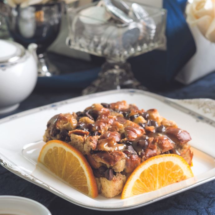 Bread pudding garnished with orange slices