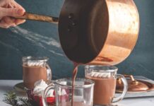 Cardamom Hot Chocolate Cardamom Hot Chocolate poured from a copper pot