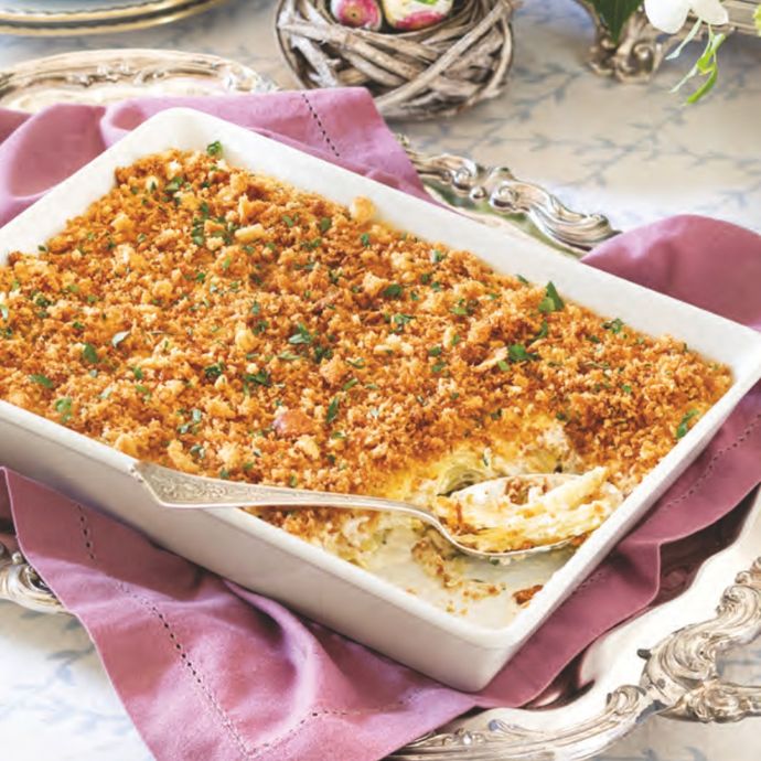 Scalloped Potatoes with Leeks in a white dish