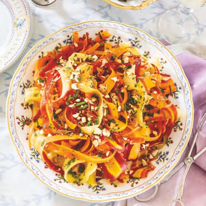 Shaved Carrot Salad on a fine china plate
