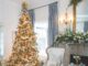 Holiday Elegance Abounds in a Southern Home A Christmas tree and floral mantel display lend a living room holiday elegance