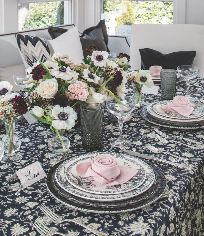 Wintertime tabletop with black, white, and pink decor