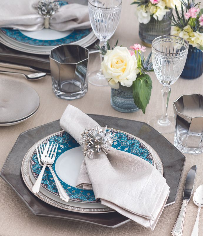 Blue, silver, and white place setting
