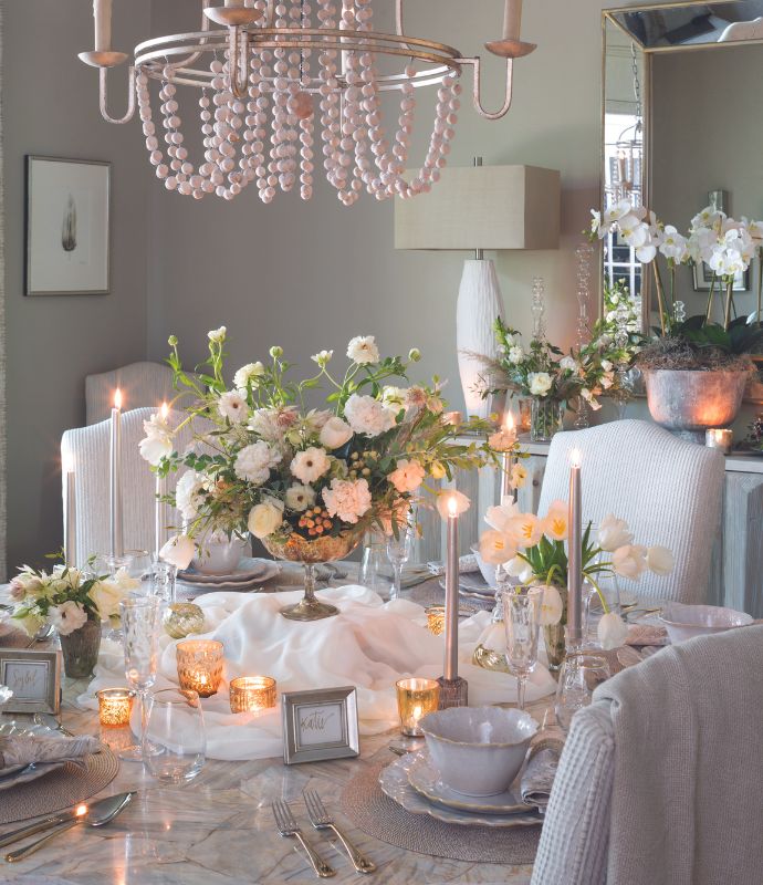Candlelit dining room with a neutral palette