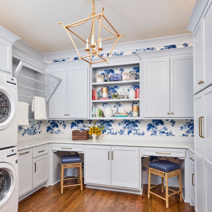 Laundry room with blue floral wallpaper