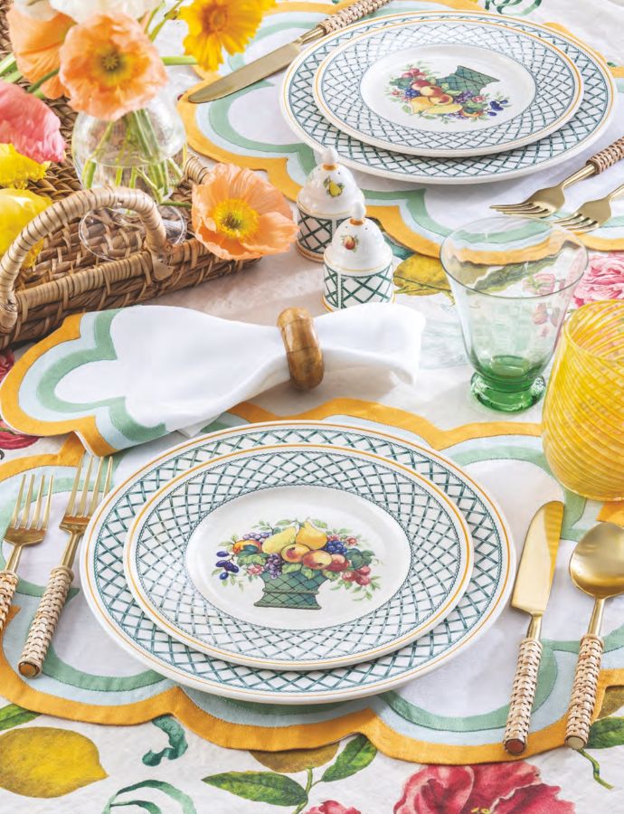 Fruit basket-motif china on a colorful tabletop