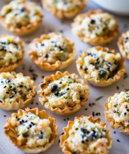 Creamy, cheesy and crispy … these Crispy Cajun Shrimp Cups by The Beach House Kitchen are the perfect savory bite for any party, or special family dinner.