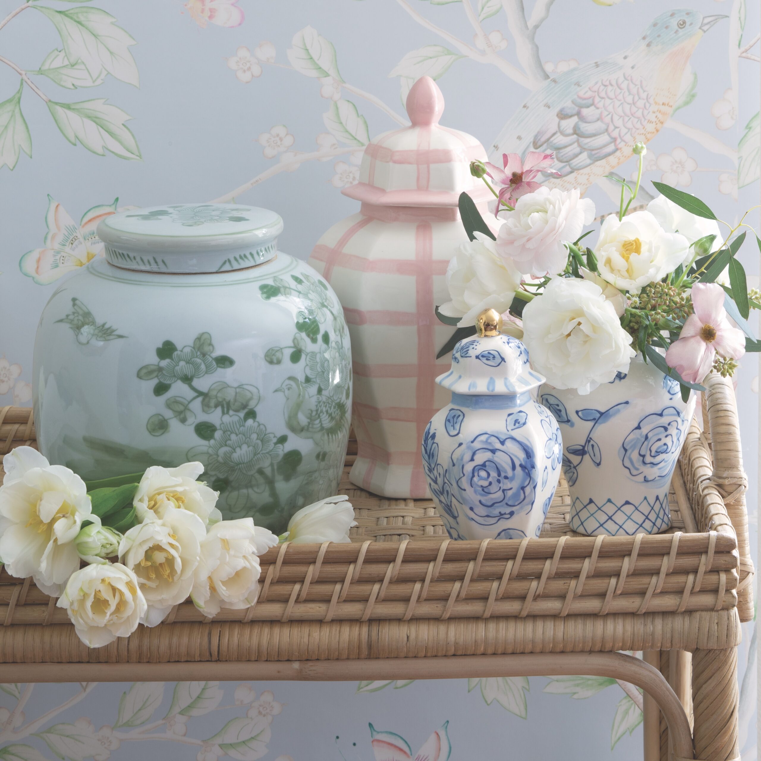Assorted ginger jars in blue, green, and pink designs