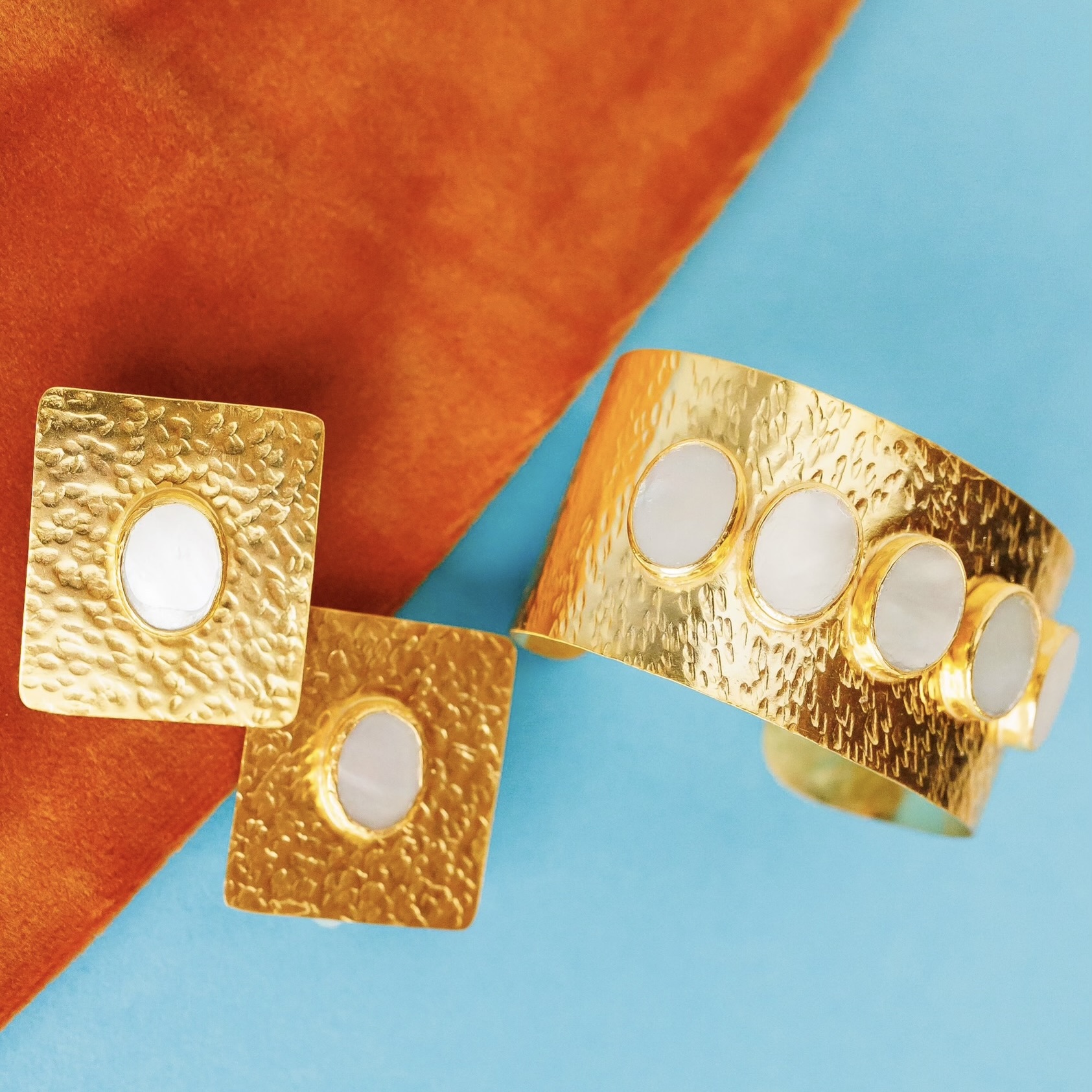 gold earrings and matching bracelet