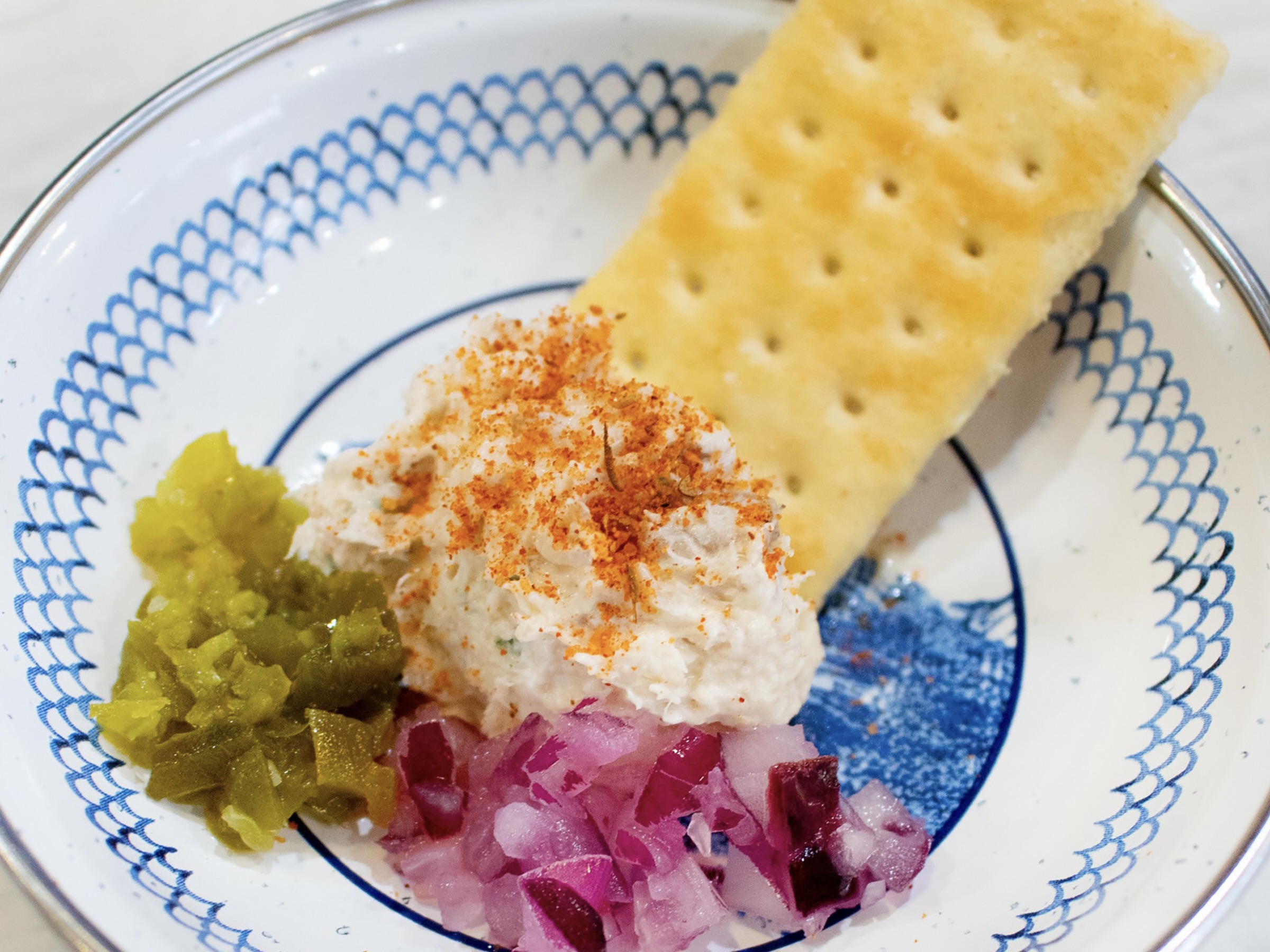 Smoked Carolina Fish Dip at Jones Oyster Co., paired with jalapeños, red onions, and crackers