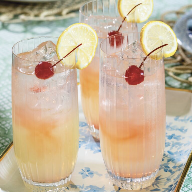 Cherry-Lemon Sparkler with cherries in tall clear glasses
