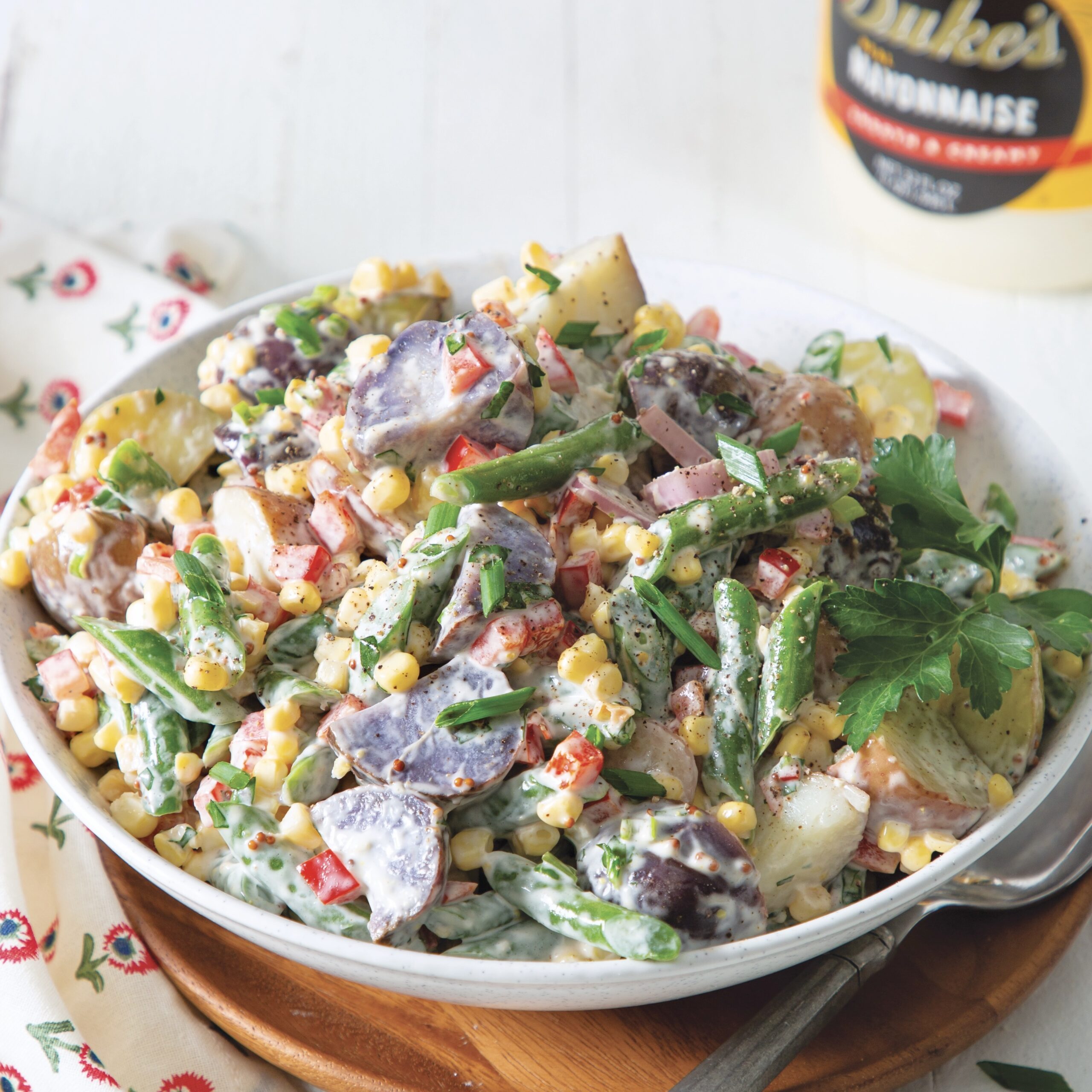 Summer's Bounty Potato Salad with Duke's Mayo jar in the background