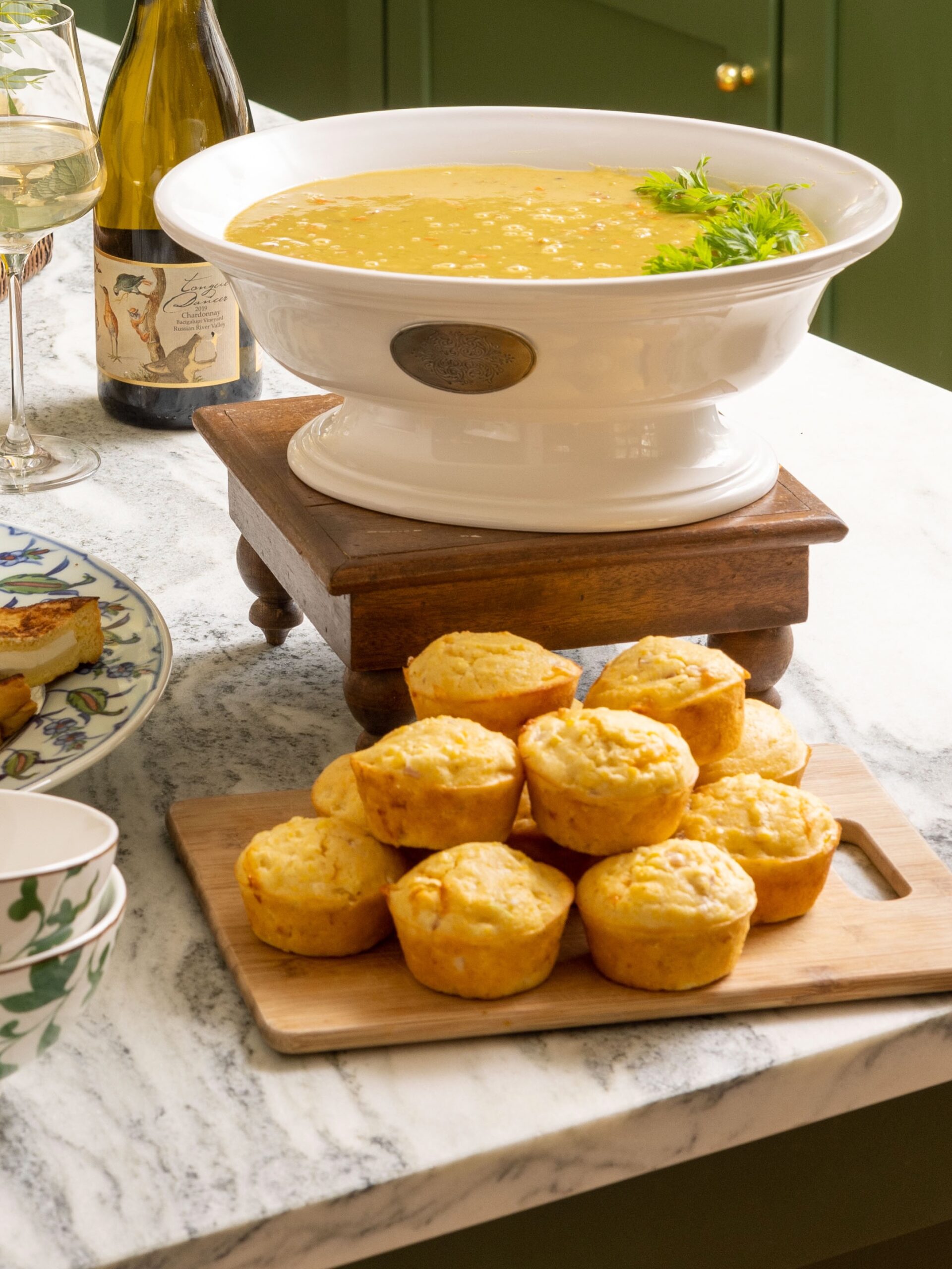 Ham and Cheddar Corn Muffins with a bowl of Split Pea Soup.