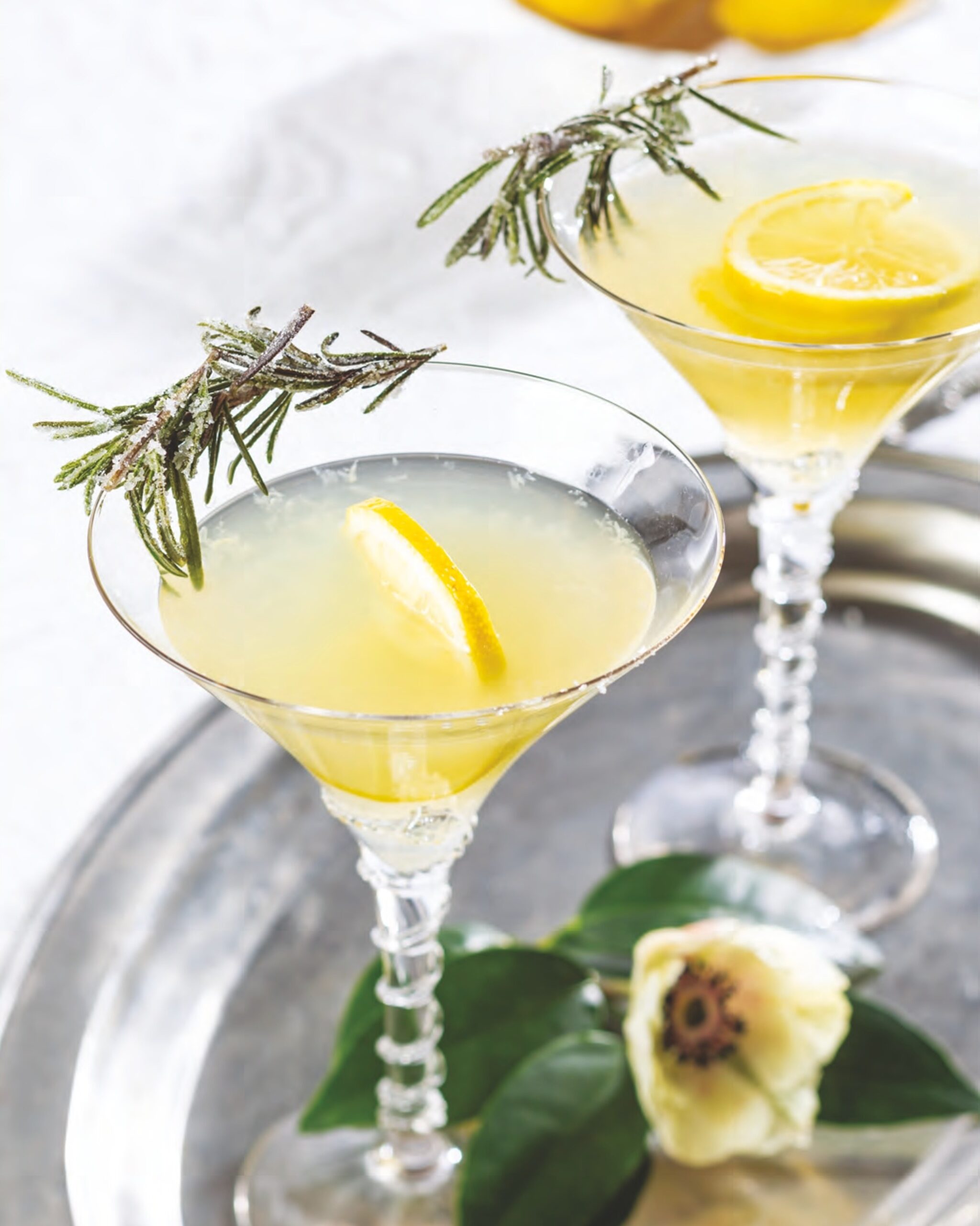 cocktails accented with sprigs of sugared rosemary.