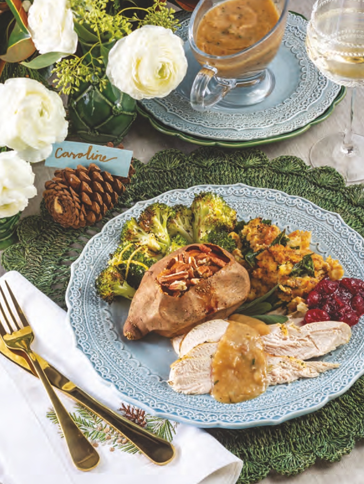 A spread of classic entrees and sides for a Christmas meal.