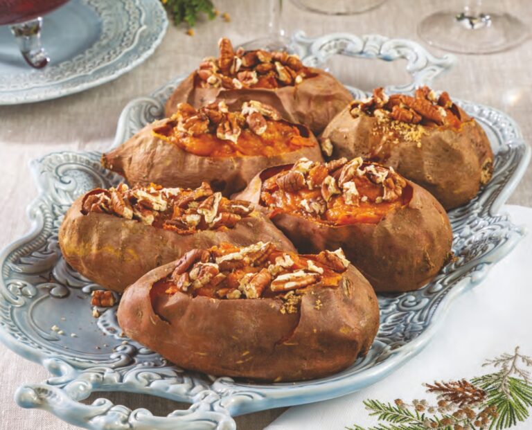 Twice-Baked Sweet Potatoes lined up on a platter.