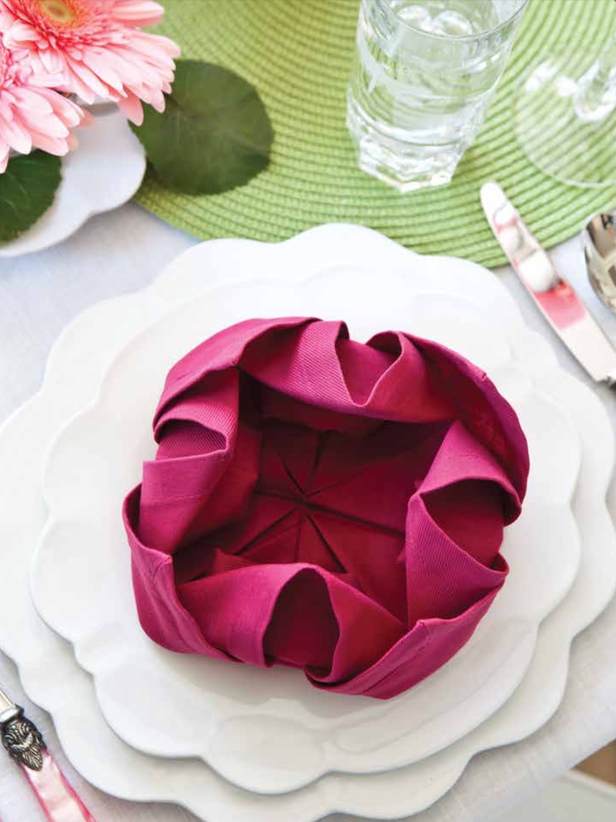 A napkin folded into the shape of a flower.