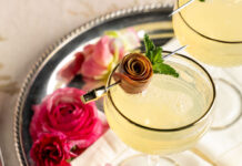 Bubbly Elderflower Mimosas Elderflower Mimosas garnished with roses made from pear slices.
