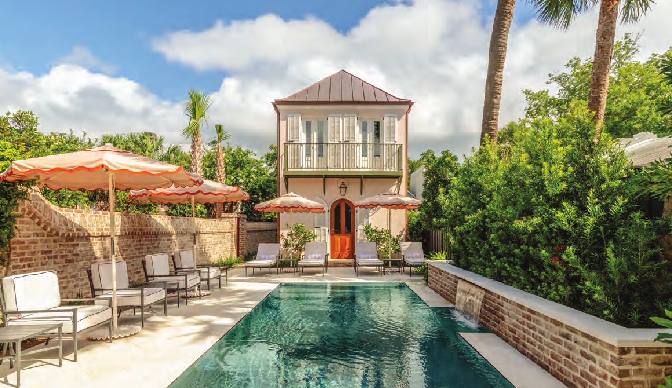 The luxurious pool courtyard of 86 Cannon hotel in Charleston.